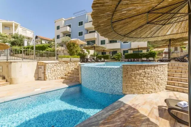 BookNoFees vacation rental in Slatine – Quiet vacation rental with ocean views and a pool